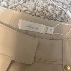 Women’s golf shorts, cream